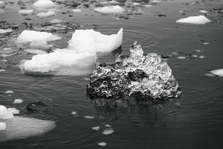Piece of glacier ice floating with sea ice in the Antarctic Ocean.