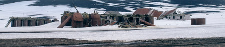 Panoramic view of an old abandoned factory in the snow.の写真素材