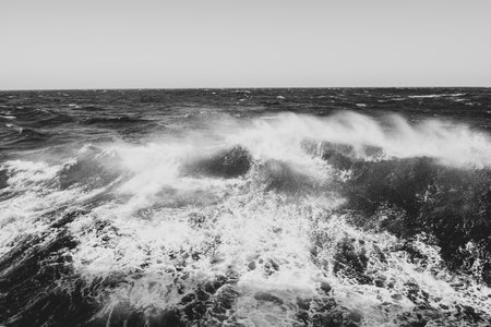 Boat wake waves in the Drake Passage, causing spray to come off   the water.の写真素材