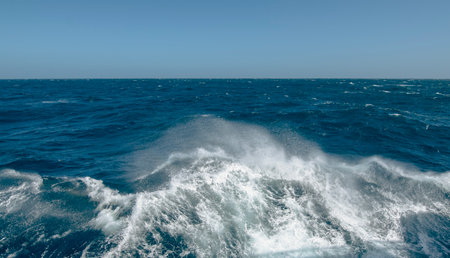 Boat wake waves in the Drake Passage, causing spray to come off   the water.の写真素材