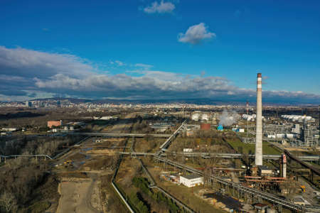 Oil refinery in construction near a large city from droneの写真素材