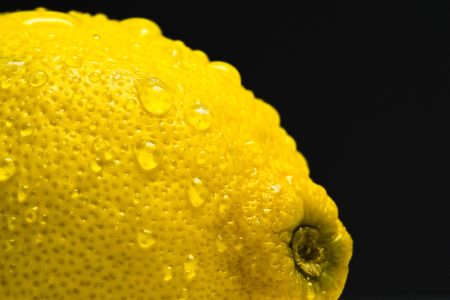 A wet lemon in summer time.の写真素材
