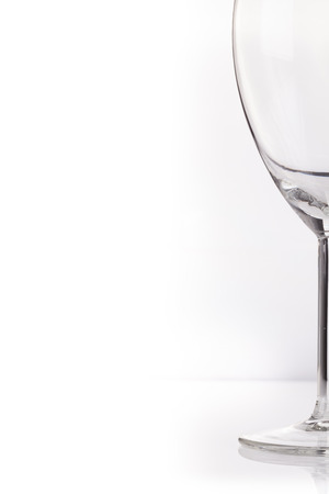Wineglass against a white background. Winelist concept.の写真素材
