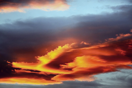 Beautiful Bright orange ,blue and yellow colors sunset sky.