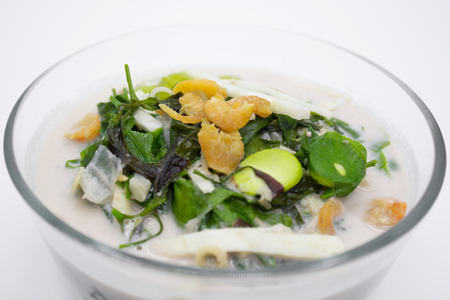 Coconut milk soup with gnetum gnemon and bamboo shoots,tropical vegetable in the south of Thailandの写真素材