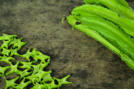 Winged beans on wooden background, Princess bean, Goa beanの写真素材
