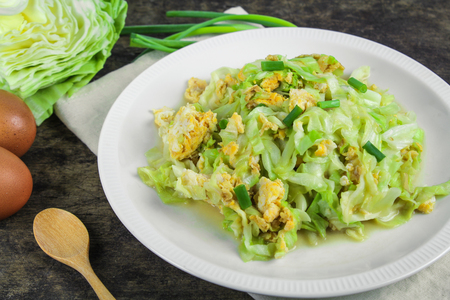 fried cabbage with egg and spring onion, healthy foodの写真素材