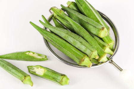fresh whole and slice organic green okra, healthy vegetableの写真素材