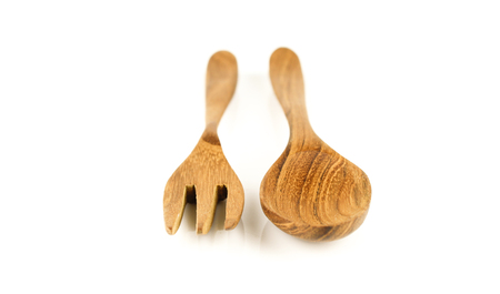 Brown wooden spoon and fork isolated on white backgroundの写真素材