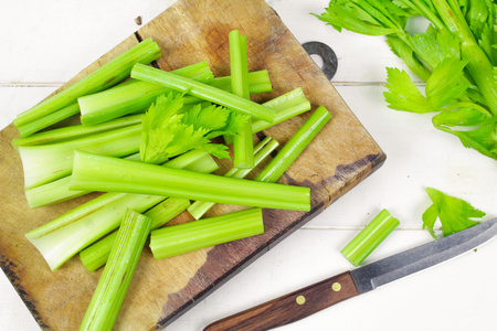 Fresh green celery isolated on white backgroundの写真素材