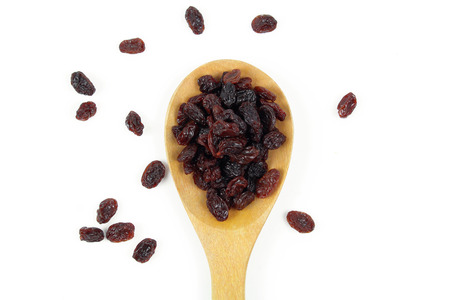 Raisins isolated on white backgroundの写真素材