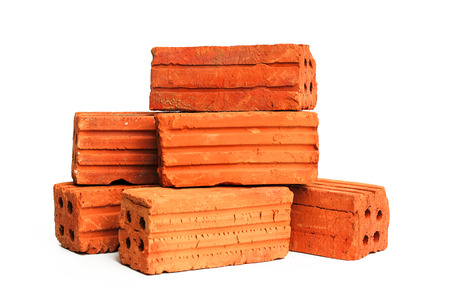 An old red brick on white background