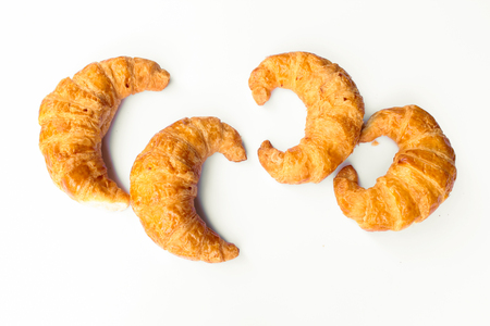 freshly baked croissants on white background, top viewの写真素材