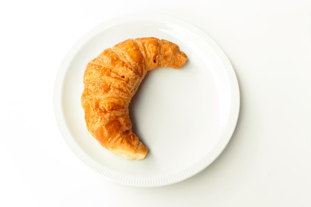 freshly baked croissants on white background, top viewの写真素材