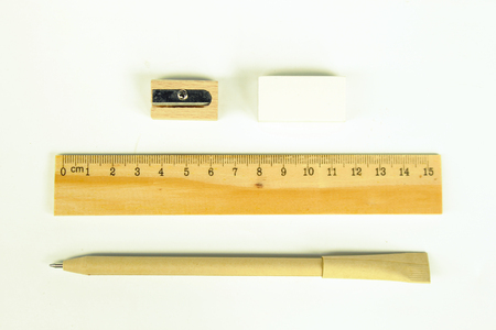 Set of wooden writing tools, pencil, pen, ruler, eraser, sharpener and bookの写真素材