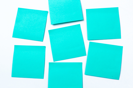 blue sticky note isolate on white backgroundの写真素材