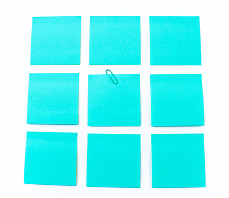 blue sticky note isolate on white backgroundの写真素材