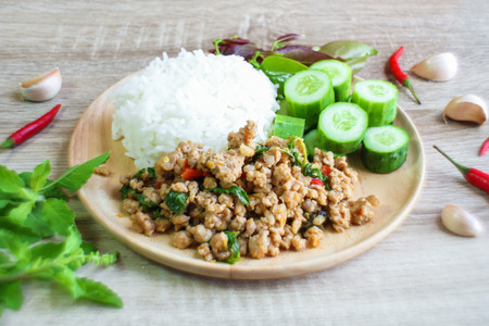 Thai spicy food, Fried pork with sweet basilの写真素材