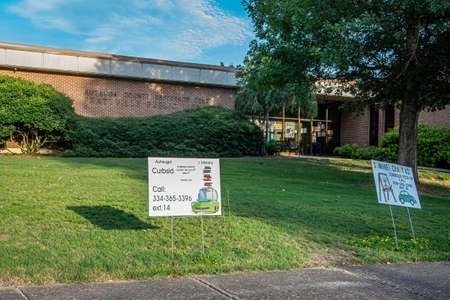 Prattville, Alabama, USA-July 4, 2020:  Signs in front of the Prattville Public Library advertising curbside pick-up during the pandemic.のeditorial素材