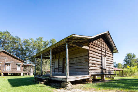Luverne, Alabama, USA - Sept. 24, 2021: A log cabin found at the Crenshaw County Historical Society Museum in rural Crenshaw County.のeditorial素材