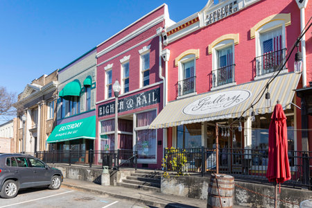 Opelika, Alabama, USA-March 3, 2021: Historic buildings along Railroad Avenue in Opelika's downtown historic district. Opelika was founded in the 1830s as Opelikan. The name was changed in 1850.のeditorial素材