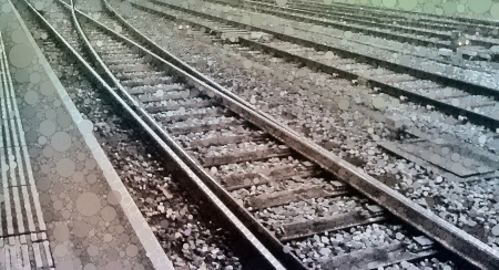 Painting-style illustration of railways, composed of pastel color circles, referring to concepts...