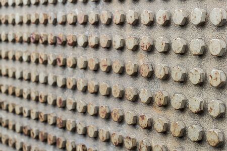 Pattern of Hex nut in Heat exchanger, the water heater in the boiler as background