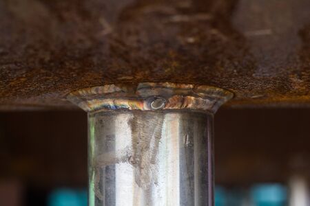 Weld joint between nozzle and shell in pressure vessel is carbon steel,  included Flange and Nozzle...