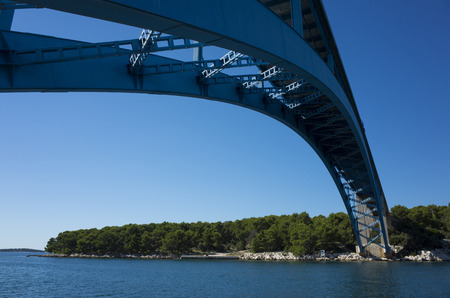 A bridge in Croatia and the Adriatic Seaの写真素材