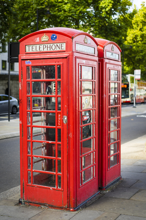 London Great Britain, October 12 2017, Typical red phone box in the city, Nice sunny autumn dayのeditorial素材