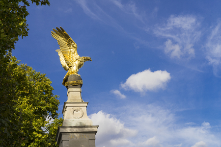 London Great Britain, October 12 2017, Royal Air Force Memorial, Nice autumn day with blue sky and golden eagle statueのeditorial素材
