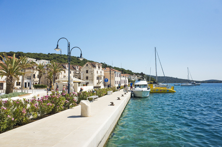 Beautiful sunny spring day at Adriatic Sea, Nice outdoors of the popular tourist city with blue sky, sea and boats.の写真素材