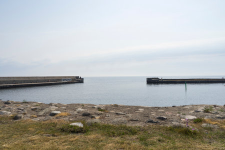 Smygehuk, Skane, Sweden - 06 20 2021 : Harbor and small fishing village and the southernmost point of Sweden.のeditorial素材