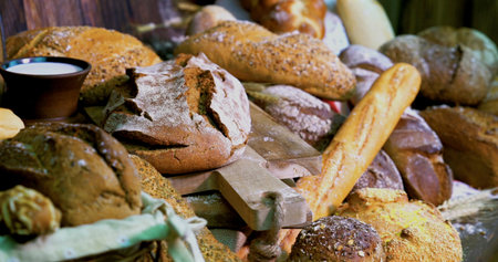 Fresh bread displayed at a local market during the morning hours, inviting customers to explore...