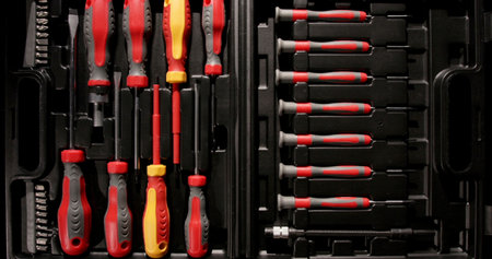 Toolset with assorted screwdrivers and attachments organized in a case for easy access and storage...