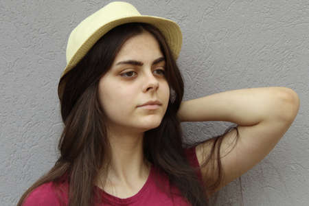 Young girl with a straw hat