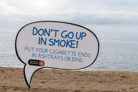 BARCELONA,SPAIN-SEPTEMBER 23,2014: Public city infomation sign for beach cleaning, Barceloneta beach, Barcelona.のeditorial素材