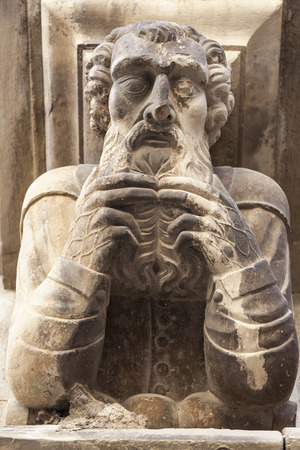 CERVERA,SPAIN-AUGUST 26,2013: Ancient corbel, located under balconies of city hall, represent different aspects of characters medieval era, Cervera, province Lleida, Catalonia.のeditorial素材