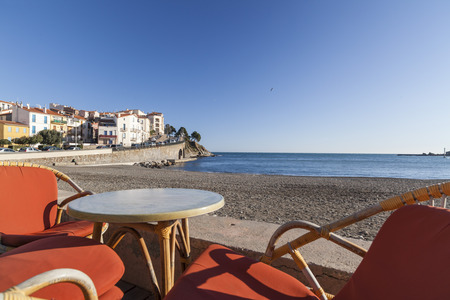 BANYULS-SUR-MER,FRANCE-JANUARY 24, 2012: Beach and terrace bar view of maritime french village of...