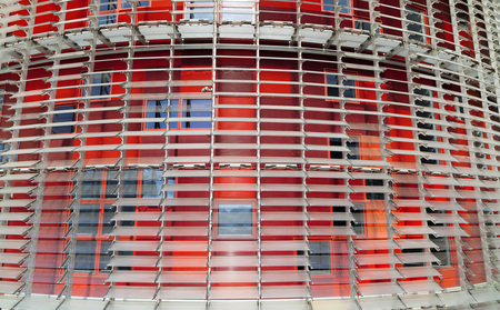 BARCELONA,SPAIN-SEPTEMBER 16,2011: Detail colored facade tower, Torre Agbar, by Jean Nouvel, iconic monument of contemporary architecture of Barcelona.のeditorial素材