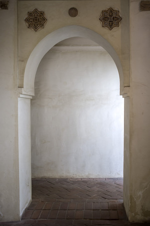 MALAGA,SPAIN-SEPTEMBER 20,2011: Alcazaba, militar construction, arab legacy. Door.のeditorial素材