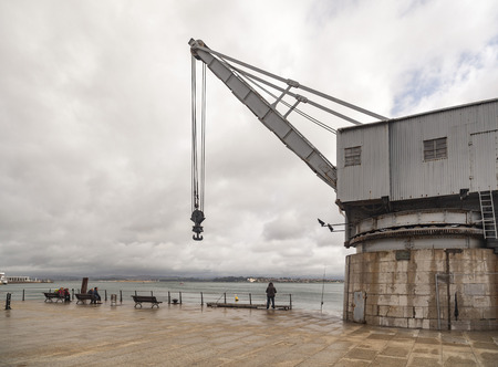 SANTANDER,SPAIN-SEPTEMBER 23, 2015:Old crane in port of Santander, Cantabria, Spain.のeditorial素材