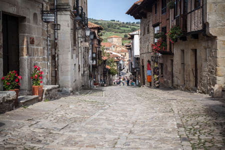 SANTILLANA DEL MAR, SPAIN.SEPTEMBER 24,2015: Typical street in touristic village of Santillana del Mar, province Santander, Cantabria, Spain.のeditorial素材