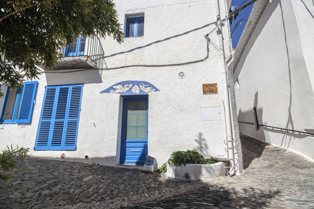CADAQUES,SPAIN-MAY 21,2015:Narrow street in town of Cadaques,Costa Brava, province Girona, Catalonia.のeditorial素材