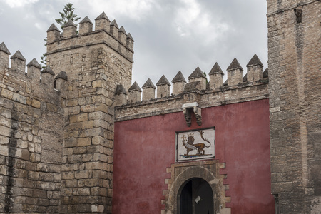 SEVILLE,SPAIN-OCTOBER 19,2013: Alcazar of Seville, Reales Alcazares de Sevilla, entrance, Lion gate, Puerta del Leon,Andalucia, Spain.のeditorial素材