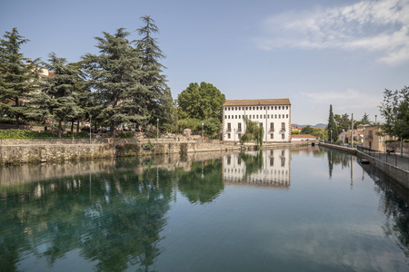 CAPELLADES,SPAIN-JULY 16,2013: Museum paper mill over pond or Moli de la Vila. Capellades, Province Barcelona, Catalonia, Spain.のeditorial素材