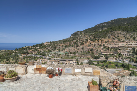 DEIA,SPAIN-APRIL 15,2013:Cemetery with mountain, Serra de Tramuntana, and mediterranean sea in balearic village of Deia, Majorca island, Balearic Islands, Spain.のeditorial素材