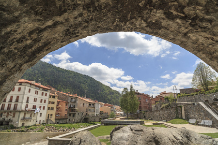 CAMPRODON,SPAIN-MAY 14,2012: Village view, Ter river and bridge, Pont Nou, gothic style, Camprodon,...