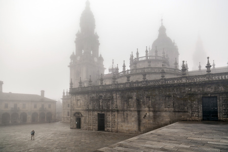 SANTIAGO DE COMPOSTELA,SPAIN-NOVEMBER 10,2015:Cathedral, Obradoiro in a foggy day in autumn,Quinatana square,Santiago de Compostela, Galicia, Spain.のeditorial素材