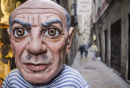 BARCELONA,SPAIN-NOVEMBER 2,2015: Puppet head Pablo Picasso in old street in gothic quarter of...